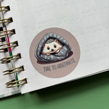 Load image into Gallery viewer, Time to Hibernate hedgehog sticker. 51mm x 51mm circle gloss paper sticker.