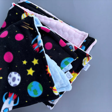 Outer space fleece bubble fleece handling blankets for small pets.