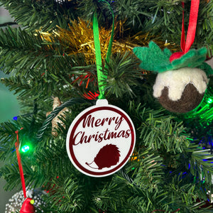 Merry Christmas tree decoration. Hedgehog Christmas tree decoration.