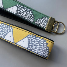 Load image into Gallery viewer, Hedgehog wristlet keyring. Spike hedgehog keychain. Green or mustard hedgehog wrist strap keyring.