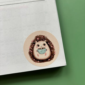 Hot chocolate hedgehog stickers. 51mm x 51mm circle gloss paper sticker.