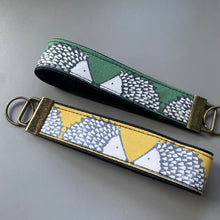 Load image into Gallery viewer, Hedgehog wristlet keyring. Spike hedgehog keychain. Green or mustard hedgehog wrist strap keyring.