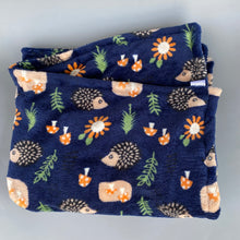 Load image into Gallery viewer, Navy hedgehogs cuddle fleece handling blankets for small pets. Fleece lap blankets.