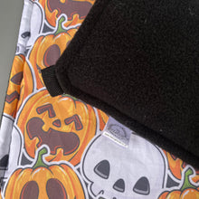 Load image into Gallery viewer, Pumpkin and skulls Halloween padded hammock. Guinea pig hammock. Rat hammock.