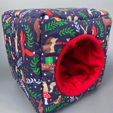 Load image into Gallery viewer, Navy festive party animals cosy cube house. Padded hedgehog and guinea pig cube house.