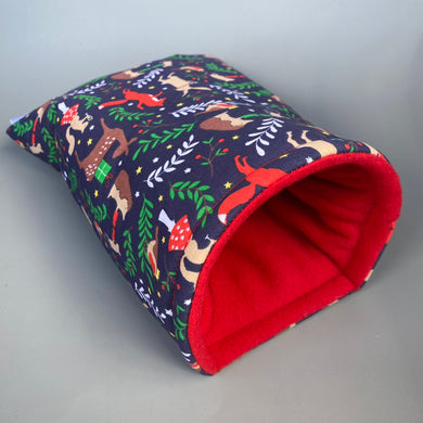 Navy festive party animals cosy snuggle cave. Padded stay open bed. Fleece pet bedding.
