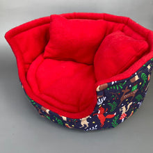 Load image into Gallery viewer, LARGE Navy festive party animals cuddle cup. Pet sofa. Guinea pig bed. Fleece pet bed.