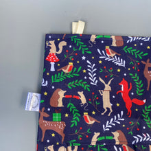 Load image into Gallery viewer, Navy festive party animals hanging hay bag for guinea pigs. Cotton hay feeder.