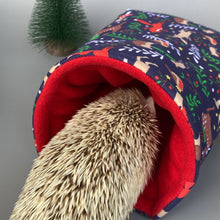 Load image into Gallery viewer, Navy festive party animals cosy snuggle cave. Padded stay open bed. Fleece pet bedding.