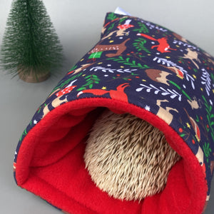 Navy festive party animals cosy snuggle cave. Padded stay open bed. Fleece pet bedding.