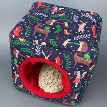 Load image into Gallery viewer, Navy festive party animals cosy cube house. Padded hedgehog and guinea pig cube house.