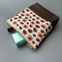 Load image into Gallery viewer, Cream and brown hedgehog zipper pouch. Makeup bag, small cosmetic zip pouch.