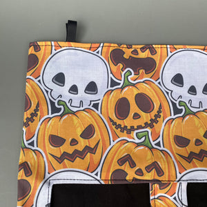 Pumpkin and skulls Halloween guinea pigs hanging hay bag for guinea pigs.