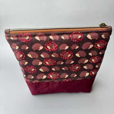 Brown and wine hedgehog zipper pouch. Makeup bag, small cosmetic zip pouch.