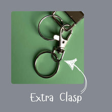 Load image into Gallery viewer, Reading hedgehog wristlet keychain. Hedgehog keyring. Hedgehog wrist strap keyring.