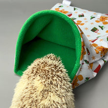 Load image into Gallery viewer, Christmas gingerbread man snuggle sack or snuggle pouch. Fleece lined sleeping bag for hedgehogs, guinea pigs and small animals