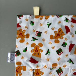 Christmas gingerbread man hanging hay bag for guinea pigs. Cotton hay feeder.