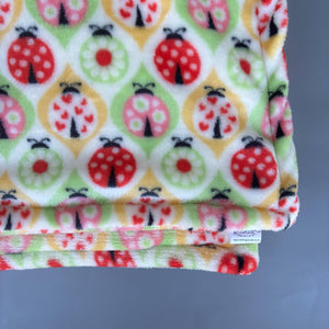 Ladybird cuddle fleece handling blankets for small pets like hedgehogs, guinea pigs, rats, etc. Fleece lap blankets.