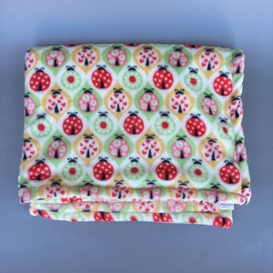 Ladybird cuddle fleece handling blankets for small pets like hedgehogs, guinea pigs, rats, etc. Fleece lap blankets.