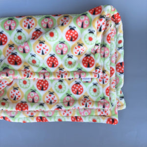 Ladybird cuddle fleece handling blankets for small pets like hedgehogs, guinea pigs, rats, etc. Fleece lap blankets.