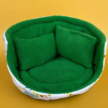 Load image into Gallery viewer, Clouds and bunting cuddle cup. Pet sofa. Hedgehog and small guinea pig bed. Small pet beds. Fleece sofa bed.