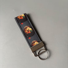Load image into Gallery viewer, Reading hedgehog keychain. Hedgehog keyring. Hedgehog key fob.
