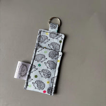 Load image into Gallery viewer, Lip Balm Holder Keychain. Hedgehog lip balm keyring.