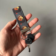Load image into Gallery viewer, Reading hedgehog keychain. Hedgehog keyring. Hedgehog key fob.