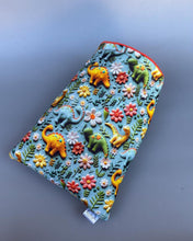 Load image into Gallery viewer, Dinosaur cosy snuggle cave. Padded stay open snuggle sack. Hedgehog bed. Fleece pet bedding.