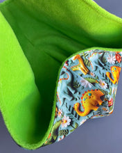 Load image into Gallery viewer, Dinosaur bonding scarf for hedgehogs and small pets. Bonding pouch. Fleece lined.