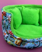Load image into Gallery viewer, Dinosaur cuddle cup. Hedgehog and small pet bed. Fleece pet sofa bed.