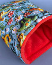 Load image into Gallery viewer, Dinosaur cosy snuggle cave. Padded stay open snuggle sack. Hedgehog bed. Fleece pet bedding.