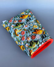 Load image into Gallery viewer, Dinosaur cosy snuggle cave. Padded stay open snuggle sack. Hedgehog bed. Fleece pet bedding.