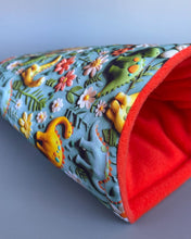 Load image into Gallery viewer, Dinosaur cosy snuggle cave. Padded stay open snuggle sack. Hedgehog bed. Fleece pet bedding.