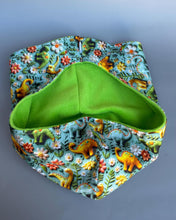 Load image into Gallery viewer, Dinosaur bonding scarf for hedgehogs and small pets. Bonding pouch. Fleece lined.