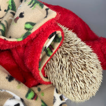 Load image into Gallery viewer, Dinosaur and red light cuddle fleece handling blankets for small pets.