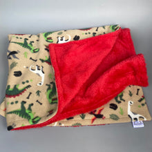 Load image into Gallery viewer, Dinosaur and red light cuddle fleece handling blankets for small pets.