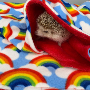 Rainbow and red light cuddle fleece handling blankets for small pets.