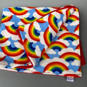 Rainbow and red light cuddle fleece handling blankets for small pets.