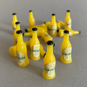 Lemonade photo prop. Lemons and lemonade bottle resin props for photos.