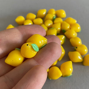 Lemonade photo prop. Lemons and lemonade bottle resin props for photos.