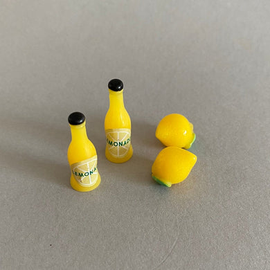 Lemonade photo prop. Lemons and lemonade bottle resin props for photos.