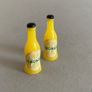 Lemonade photo prop. Lemons and lemonade bottle resin props for photos.