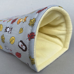 Grey and yellow woodland animals cosy snuggle cave. Padded stay open snuggle sack. Hedgehog bed. Fleece pet bedding.