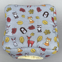 Load image into Gallery viewer, Grey and yellow woodland animals cosy cube house. Hedgehog and guinea pig padded fleece lined house.