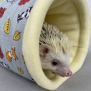 Grey and yellow woodland animals stay open padded fleece tunnel. Padded tunnel for hedgehogs and small pets.
