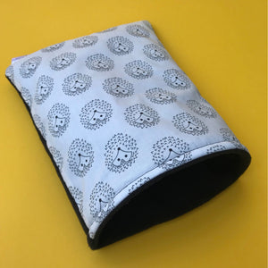 The Hoghouse black and white hedgehog cosy snuggle cave. Padded stay open hedgehog bed.