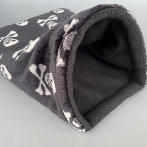 Skull and bones cuddle fleece snuggle sack, snuggle pouch, sleeping bag for hedgehogs and small pets.