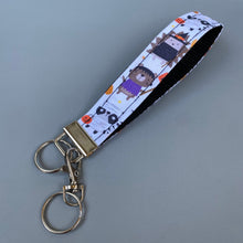 Load image into Gallery viewer, Halloween hedgehog wristlet keychain. Hedgehog keyring.