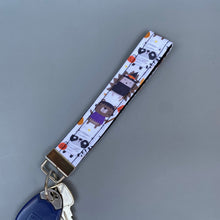 Load image into Gallery viewer, Halloween hedgehog wristlet keychain. Hedgehog keyring.